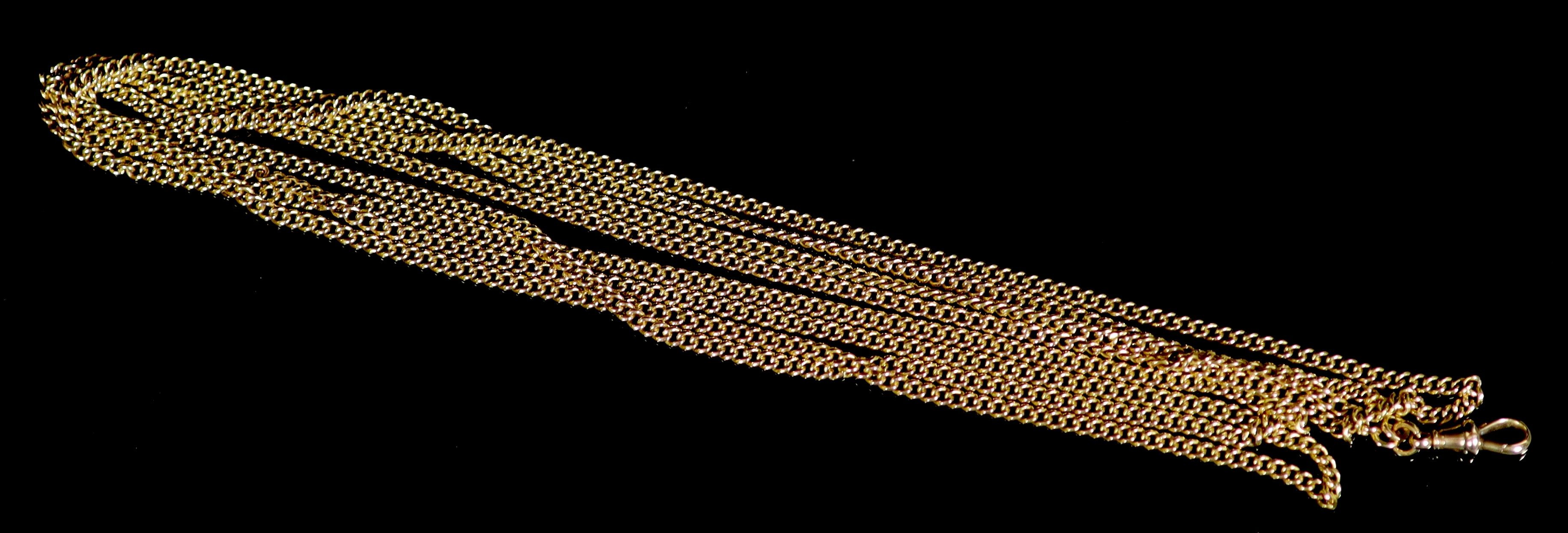 An early 20th century 15ct gold guard chain